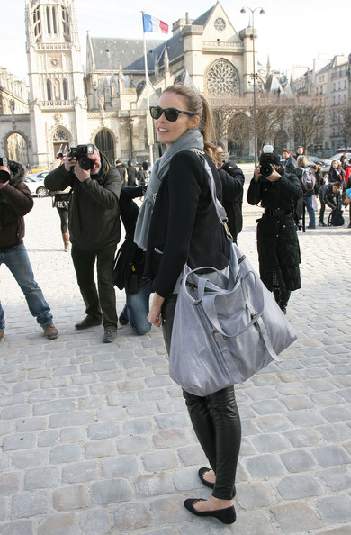Elle MacPherson, sunglasses, hair, jean color handbag