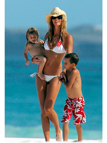 Elle Macpherson, bikini body, beach, kids, hat,sunglasses, white bikini